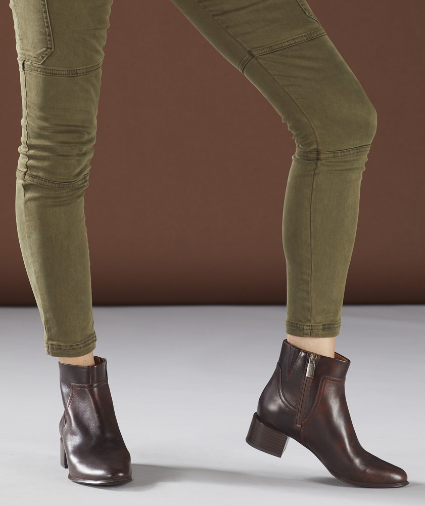 Womens legs in leather booties