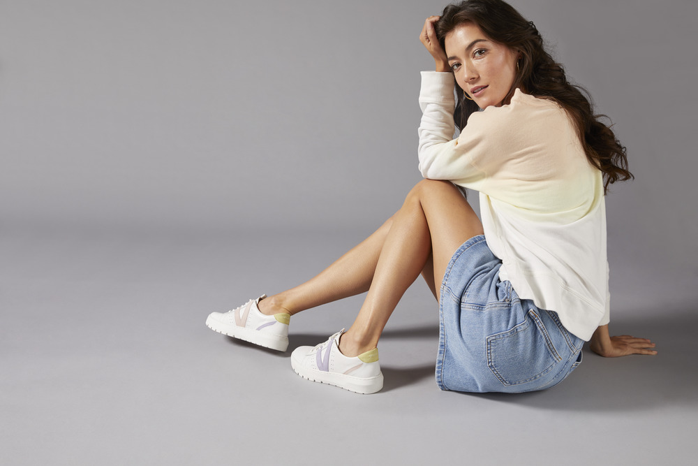Woman in athleisure putfit with active sneakers