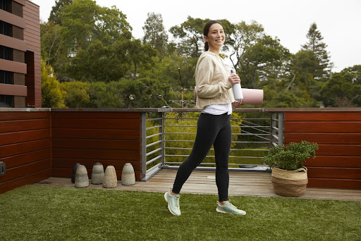 Woman training in her back yard