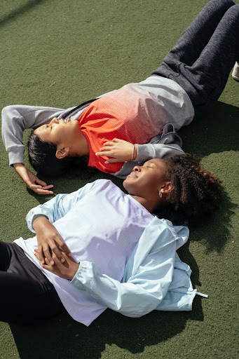 Two young women resting after hard training