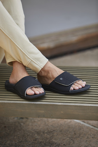 Man wearing orthotic sandals