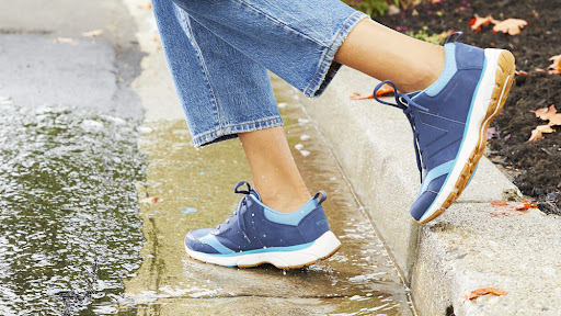 Close up shot of a person walking in shoes