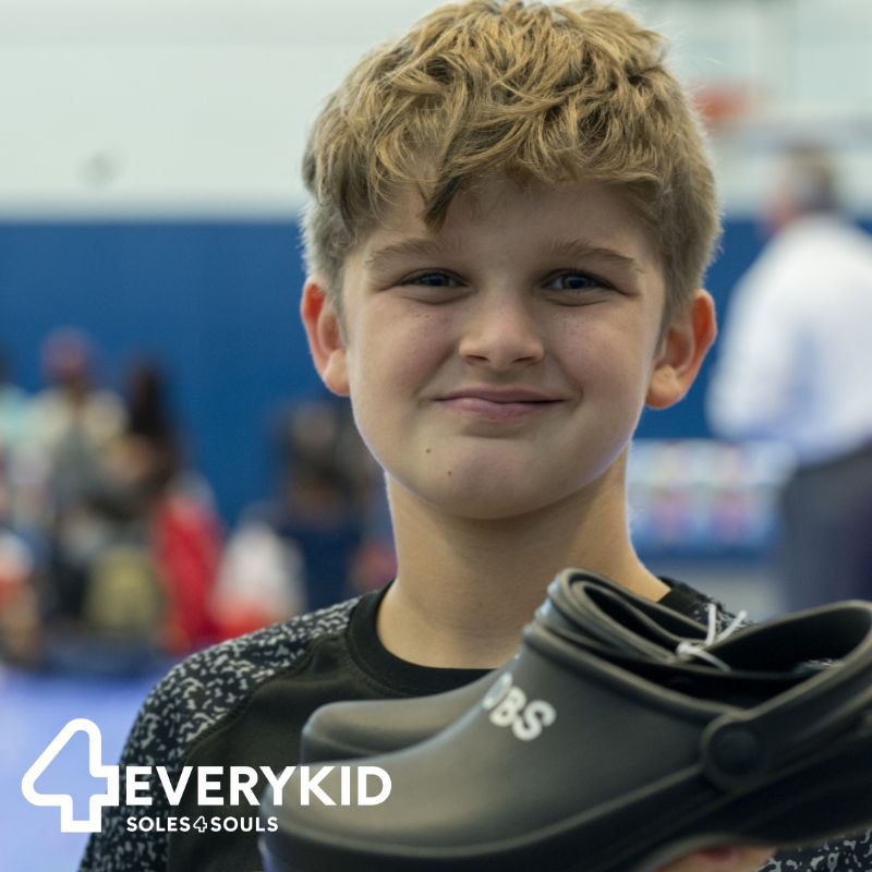 4EveryKid Soles4Souls image of child with shoes